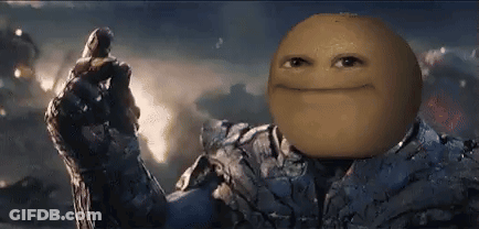 A Man In A Suit With A Smiley Face On His Face Is Holding A Glove . GIF