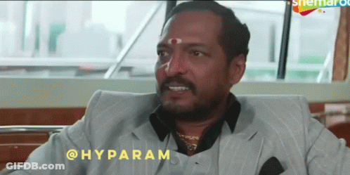 A Man In A Suit With The Word Hyparam On The Bottom Right GIF