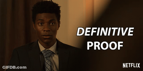 A Man In A Suit With The Words Definitive Proof Above Him GIF