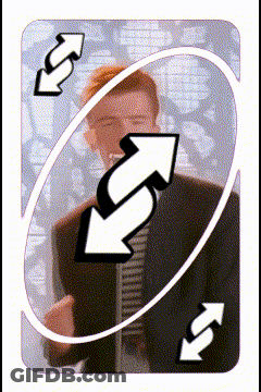 A Man In A Suit With Two Arrows Pointing To His Face GIF