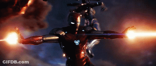 A Man In A Superhero Costume Is Flying Through The Air GIF