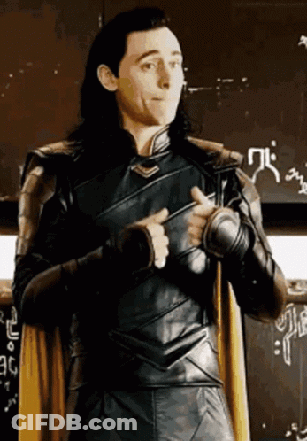 A Man In A Superhero Costume Is Giving A Thumbs Up Sign . GIF