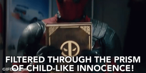 A Man In A Superhero Costume Is Holding A Book With The Words Filtered Through The Prism Of Child-Like Innocence GIF