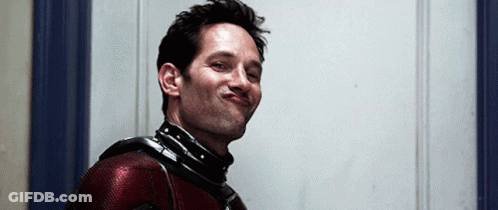 Man In Superhero Costume Making A Face GIF
