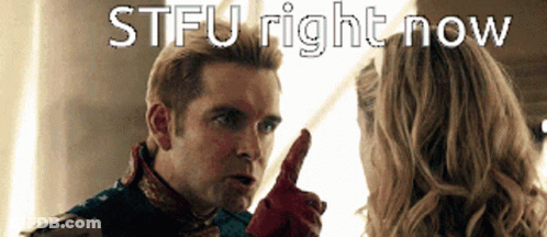 A Man In A Superhero Costume Is Pointing At A Woman With The Words Stfu Right Now Above Him GIF