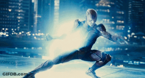 A Man In A Superhero Costume Is Shooting A Lightning Bolt GIF