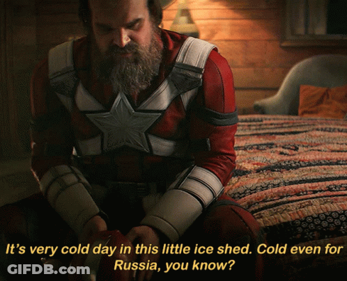 Superhero Sitting On Bed Saying Very Cold Day GIF