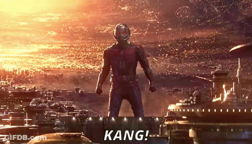 Superhero Man Standing In Front Of City GIF