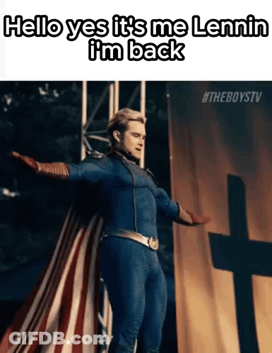 A Man In A Superhero Costume Is Standing In Front Of A Cross With His Arms Outstretched GIF
