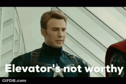 Superhero Talking To Another Man GIF