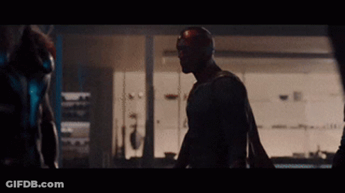 Superhero Talking To Another Man GIF