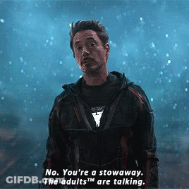 A Man In A Superhero Costume Says No You 'Re A Stowaway The Adults Are Talking . GIF