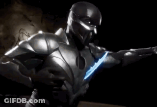 A Man In A Superhero Costume With A Light On His Chest GIF