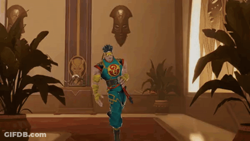 A Man In A Superhero Costume With The Letter G On His Chest Is Walking Down A Hallway GIF
