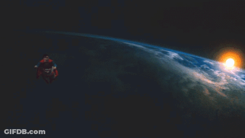A Man In A Superman Cape Flies Over The Earth GIF