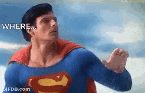 A Man In A Superman Costume Is Flying Through The Air With The Words `` Where '' Written Above Him . GIF