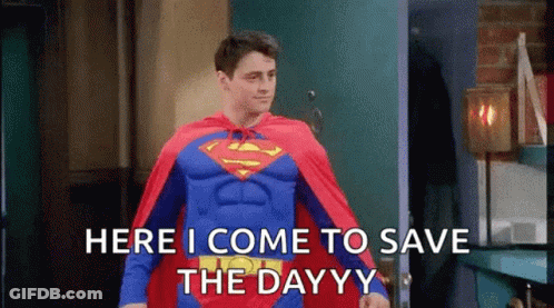 A Man In A Superman Costume Is Standing In Front Of A Door And Saying Here I Come To Save The Day . GIF