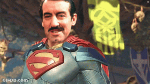A Man In A Superman Costume With A Mustache GIF