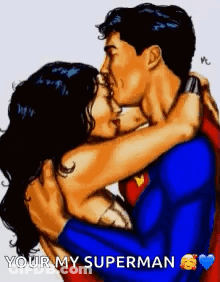 A Man In A Superman Suit Is Hugging A Woman In A Wonder Woman Costume . GIF