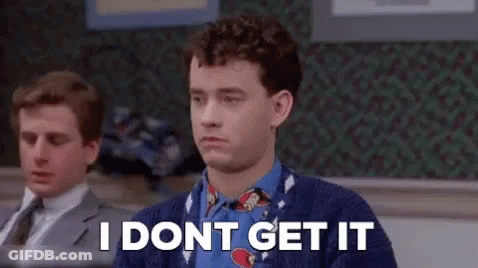 A Man In A Sweater And Tie Is Sitting In A Classroom And Saying `` I Do N't Get It '' . GIF