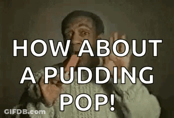 A Man In A Sweater Is Eating A Pudding Pop And Making A Funny Face . GIF