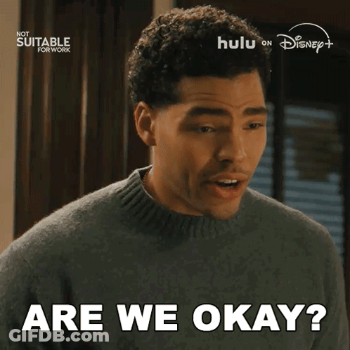 A Man In A Sweater Says " Are We Okay " In A Disney + Ad GIF