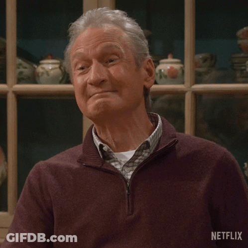 A Man In A Sweater Says Precious Moments On A Netflix Poster GIF