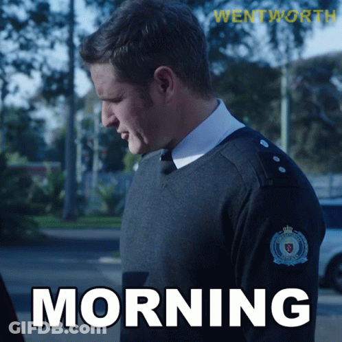 A Man In A Sweater With The Word Morning On The Bottom GIF