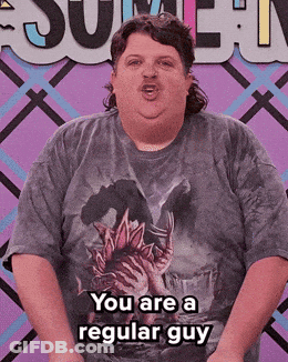 A Man In A T-Shirt That Says You Are A Regular Guy GIF