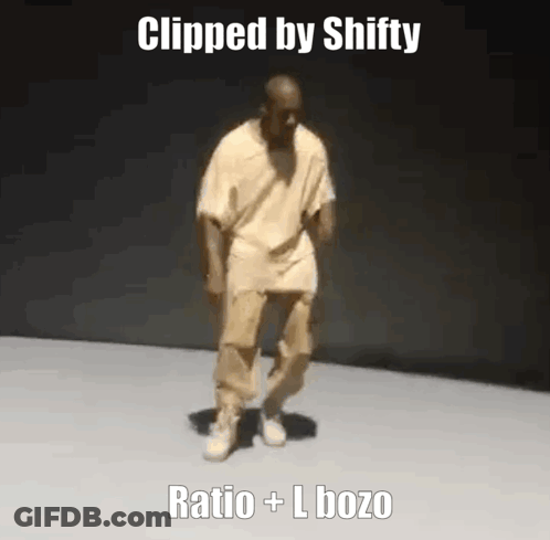 A Man In A Tan Shirt And Khaki Pants Is Dancing On A White Floor . GIF