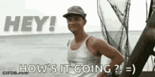A Man In A Tank Top And Hat Is Standing On A Beach And Says `` Hey ! How 'S It Going ? '' GIF