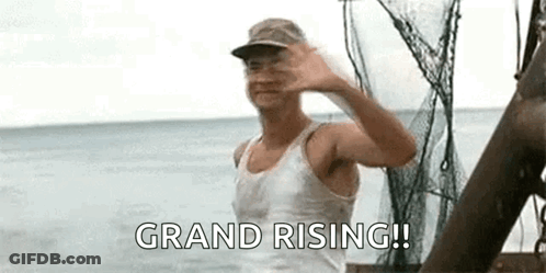 A Man In A Tank Top And Hat Is Standing On A Boat In The Ocean . GIF