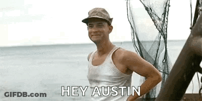 Man In Tank Top And Hat On Water Boat GIF
