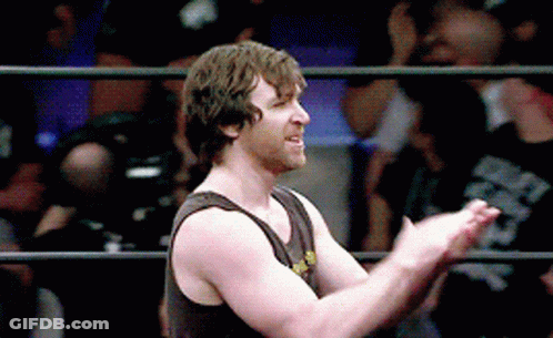 A Man In A Tank Top Is Clapping In A Ring GIF