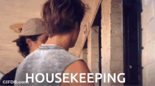 A Man In A Tank Top Is Standing Next To Another Man In A Hat And The Words Housekeeping Are Displayed On The Screen GIF