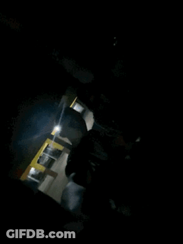 A Man In A Tank Top That Says ' Levis ' On It GIF