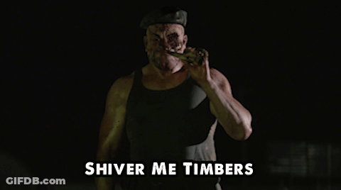 A Man In A Tank Top With The Words " Shiver Me Timbers " Above Him GIF