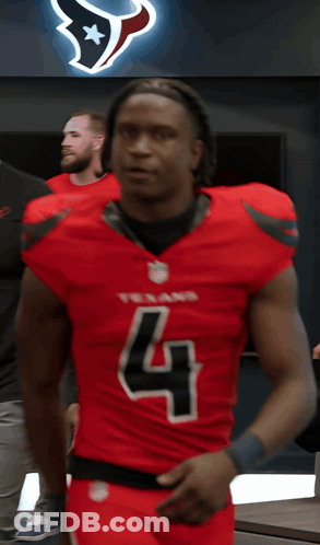 A Man In A Texans Jersey With The Number 4 On It GIF