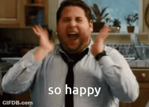 A Man In A Tie Is Making A Funny Face With The Words So Happy Written On The Bottom GIF