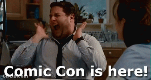 A Man In A Tie Is Screaming In A Kitchen With The Words Comic Con Is Here GIF