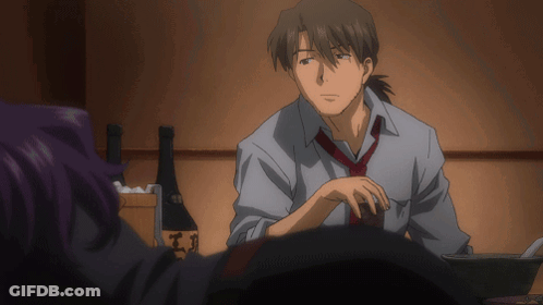 A Man In A Tie Sits At A Table In Front Of A Bottle That Says ' Ts ' On It GIF