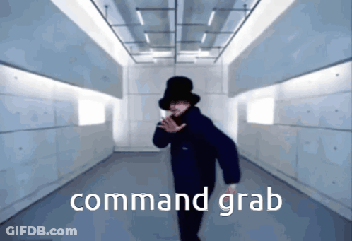 A Man In A Top Hat Is Dancing In A Hallway With The Words Command Grab Written In White GIF