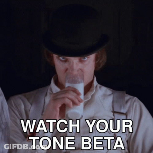 A Man In A Top Hat Is Drinking A Glass Of Milk With The Words Watch Your Tone Beta Below Him GIF