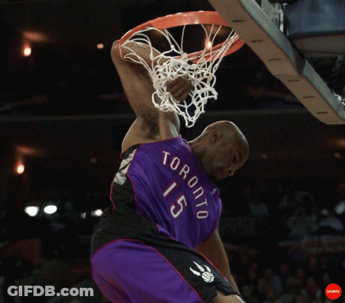 A Man In A Toronto 15 Jersey Dunks A Ball GIF