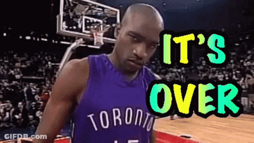 A Man In A Toronto Jersey Is Standing On A Basketball Court With The Words It 'S Over Above Him GIF