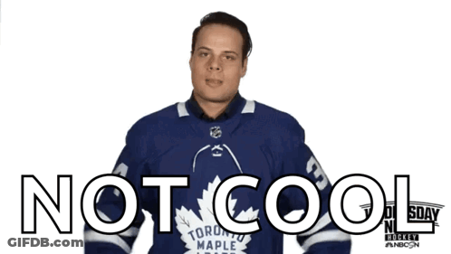 A Man In A Toronto Maple Leafs Jersey Giving A Thumbs Down Sign GIF