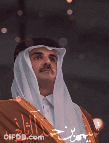 A Man In A Traditional Costume With Arabic Writing On It GIF