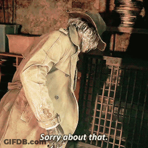 A Man In A Trench Coat And Cowboy Hat Is Saying Sorry About That GIF