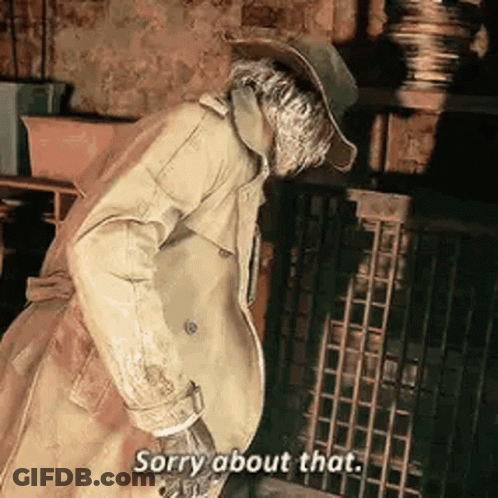 A Man In A Trench Coat And Hat Is Standing In Front Of A Fireplace And Saying Sorry About That . GIF