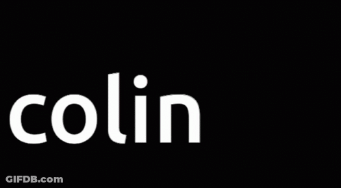 A Man In A Trench Coat Stands In Front Of The Name Colin X GIF